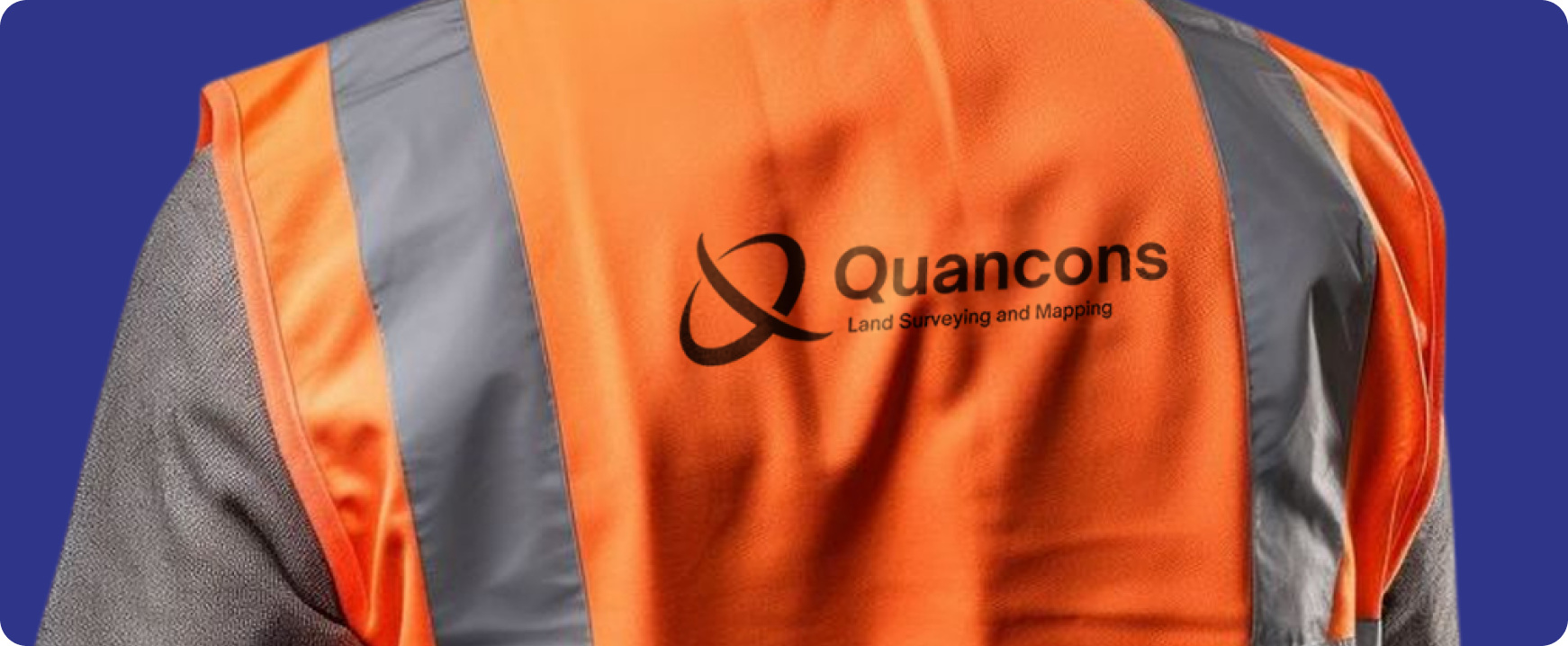 Quancons logo printed on a high-visibility safety vest